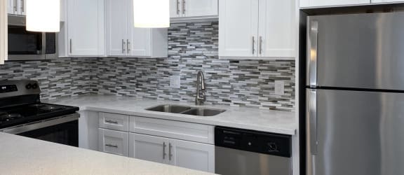 Kitchen with custom counters and cabinets