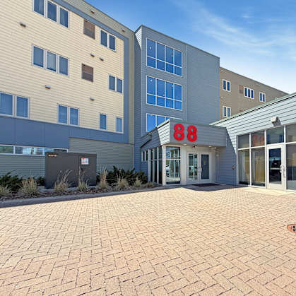 The number 88 is displayed on the front of a building.