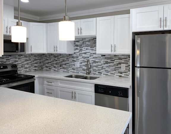 Kitchen with custom counters and cabinets