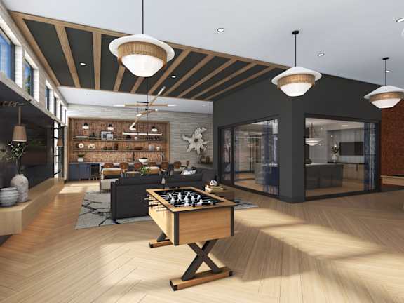A modern living room with a wooden floor and a chess table in the center.