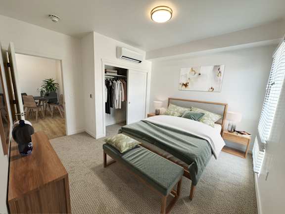 a bedroom with a bed and a dresser and a closet at Crosshatch, Garden City, ID, 83714