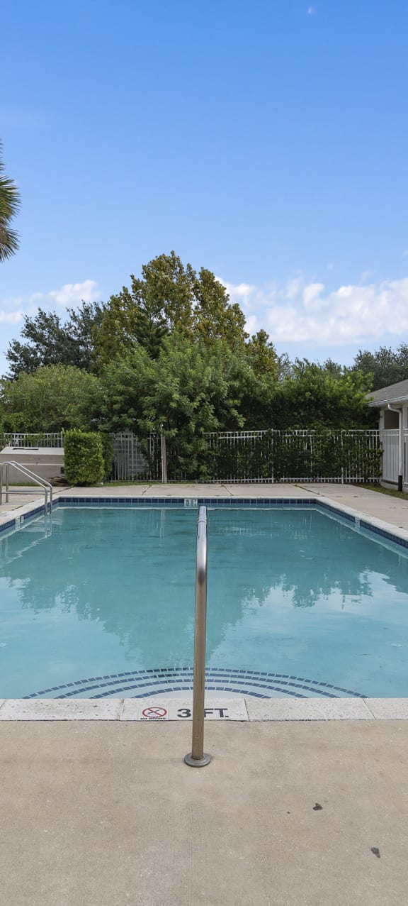 our apartments showcase an unique swimming pool at The Groves at Wimauma Apartments , Wimauma, Florida