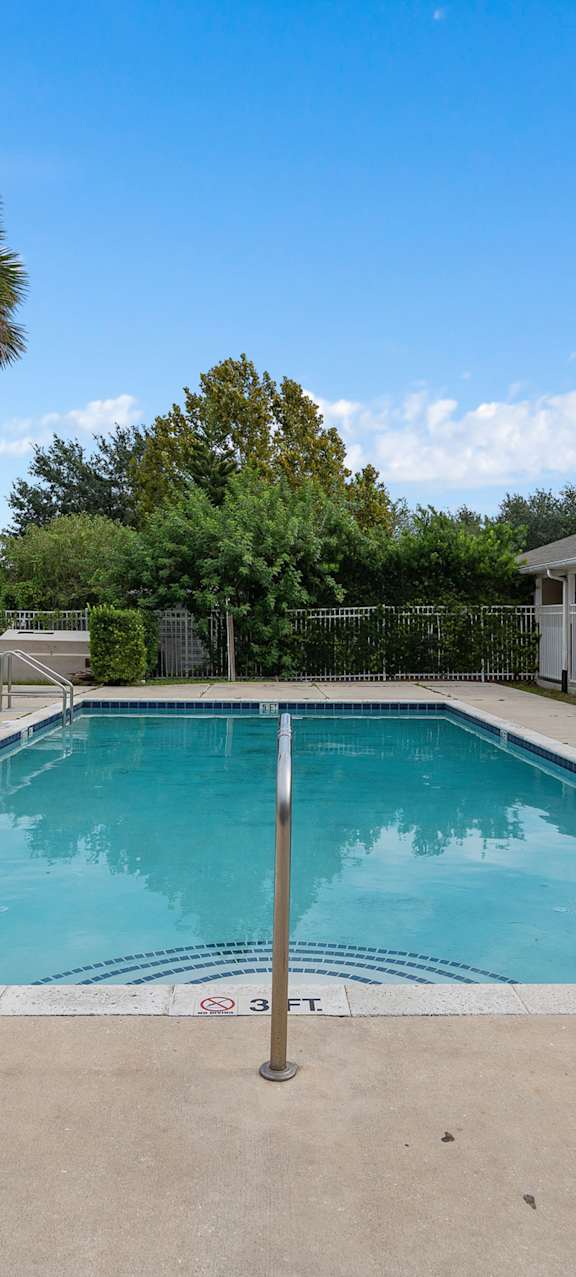 our apartments showcase an unique swimming pool at The Groves at Wimauma Apartments , Wimauma, Florida