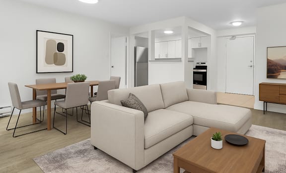 A modern living room with a beige sofa, a wooden coffee table, and a dining table with chairs.