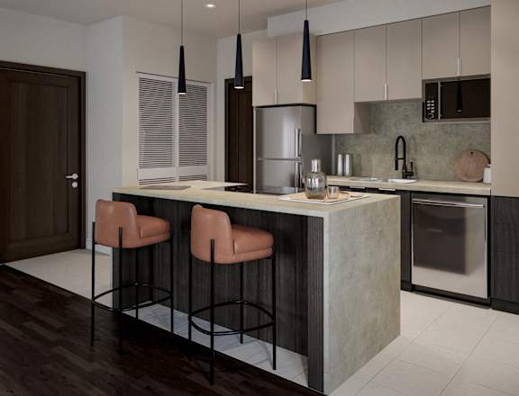 a kitchen with an island and chairs in front of a