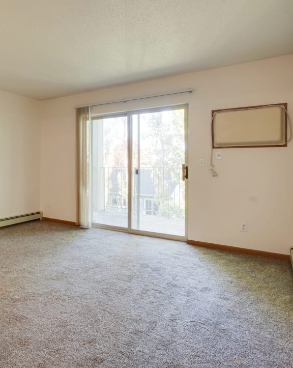 another view of the living room in a bedroom apartment at the historic electric building in fort worth