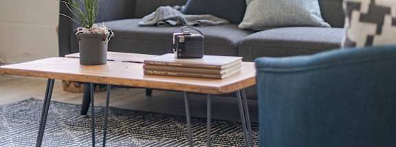 a living room with a couch and a coffee table