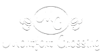 A logo with the initials "Mc" surrounded by swirls and the words "Montfort Crossing" written underneath.