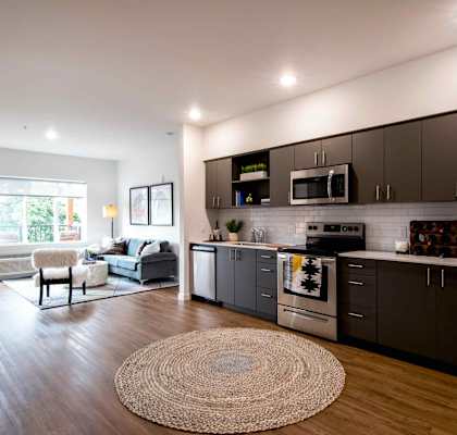 Kitchen and living area at Heather Lodge Apartments in Happy Valley