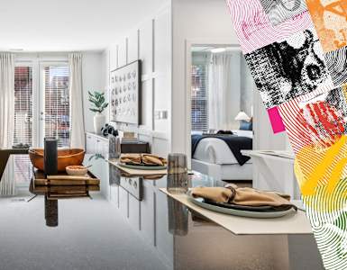 A modern kitchen with a dining area and a living room.