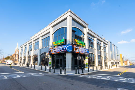 a large building on the corner of a city street at The Botanic, New Jersey