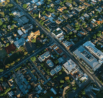 an aerial view of an intersection in a city