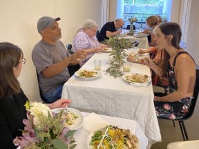Residents at The Canyons in Portland, Oregon Eating Together and Talking