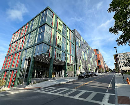 a new building on the corner of a city street