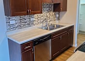 Thumbnail 14 of 48 - backsplash and stainless steel appliances