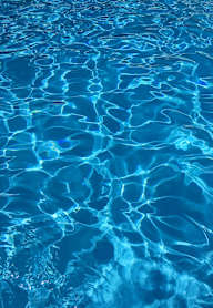 A close up view of the ripples in a swimming pool.