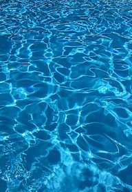 A close up view of the ripples in a swimming pool.