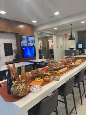 a buffet of food on a counter in a kitchen