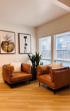 a living room with chairs at Campbell West, Campbell