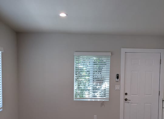 Large eating space with lots of natural lighting in kitchen at The Hardison Apartments in Pasadena, California.