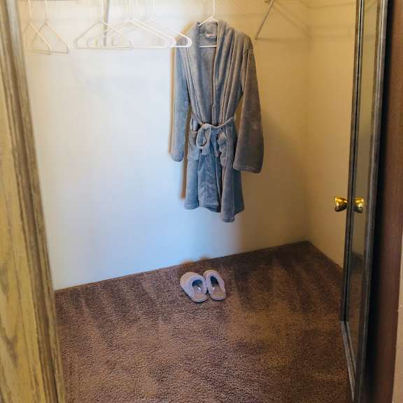 a bathroom with a sink and a toilet and a shower