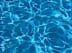 A close up view of the ripples in a swimming pool.