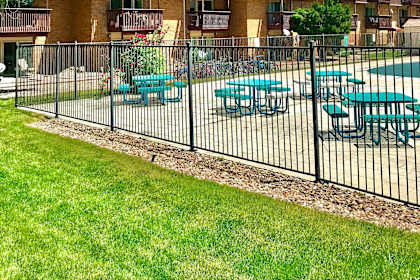 a building with a fence in front of it