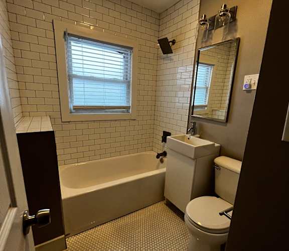 bathroom with bathtub