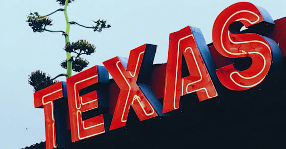 a sign that says on top of a building