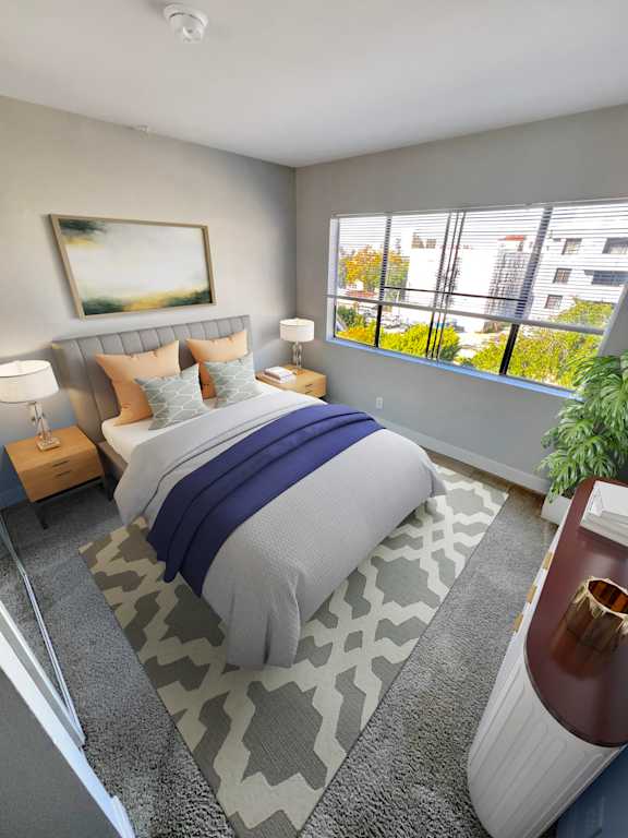 a bedroom with a bed and a large window at Duet on Wilcox, Los Angeles, 90028