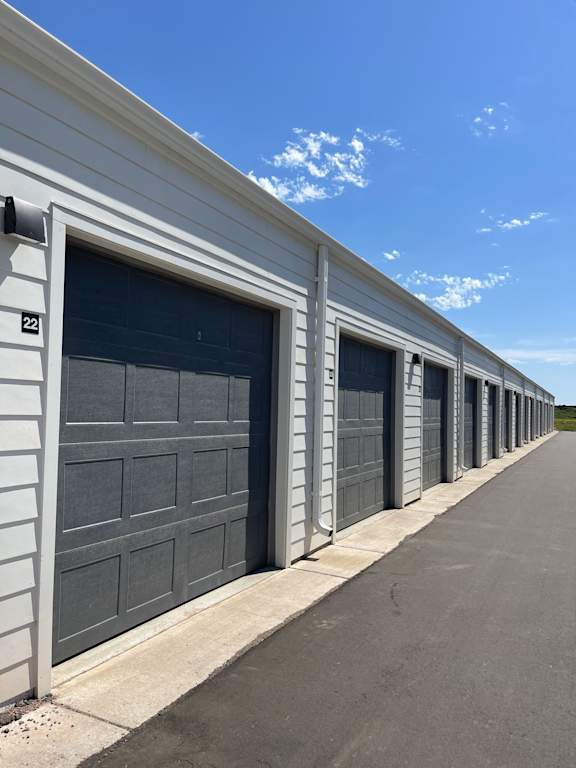 A row of garage doors are closed.
