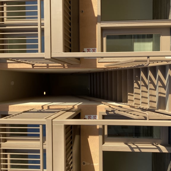 a view of the balconies of an apartment building
