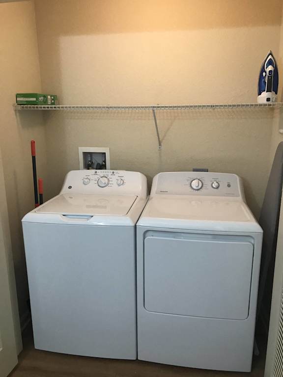 the laundry r at The Dakota Apartments, Florida 33458oom has two washes and a dryer
