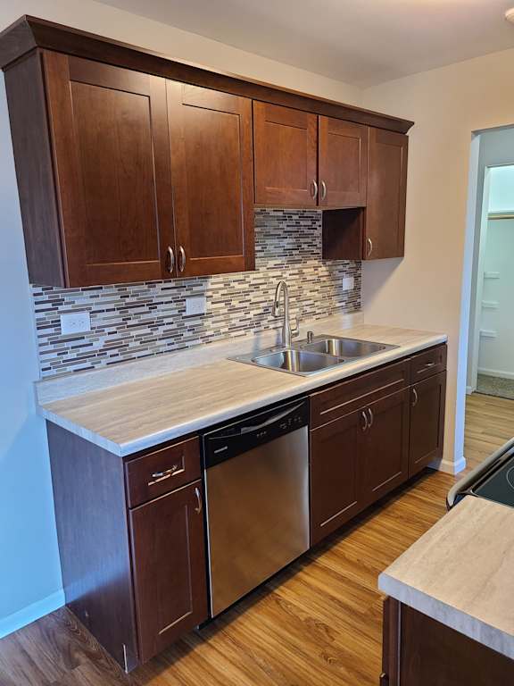 backsplash and stainless steel appliances