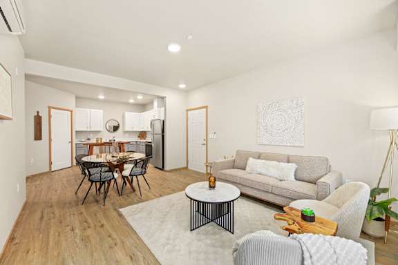 a living room with a couch and a table
