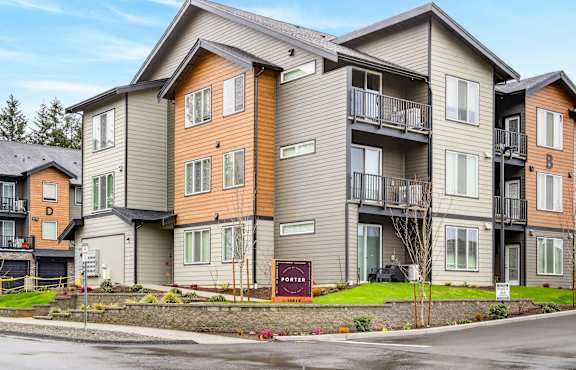 Apartment building with a sign that says "Pinehurst".