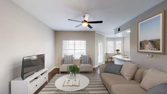 a living room with a couch and a tv at The Legends at Eagle Mountain Lake, Fort Worth, 76179