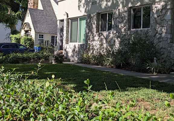 a house with a walkway in front of it
