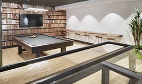 a game room with a pool table and a tv at The Promenade Rio Vista, San Diego, California