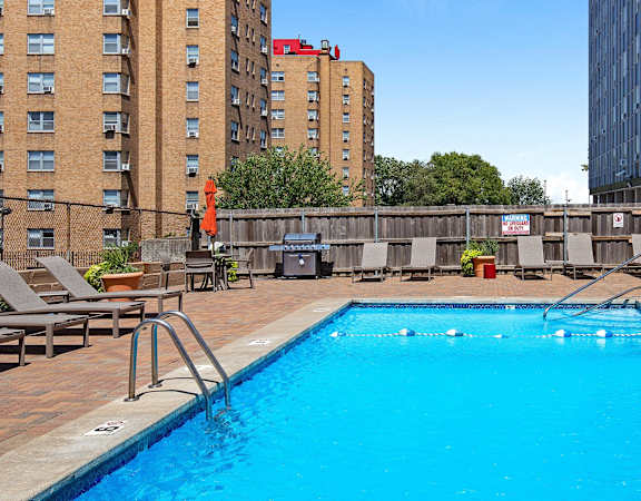 910 Penn - Sparkling resort-style pool with surrounding sundeck