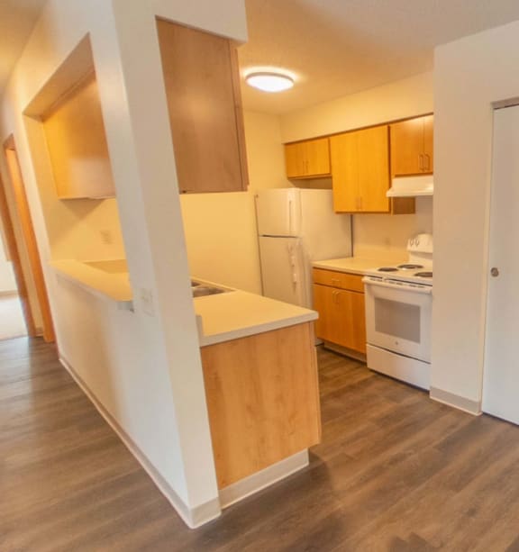 a bedroom with a bed and a ceiling fan