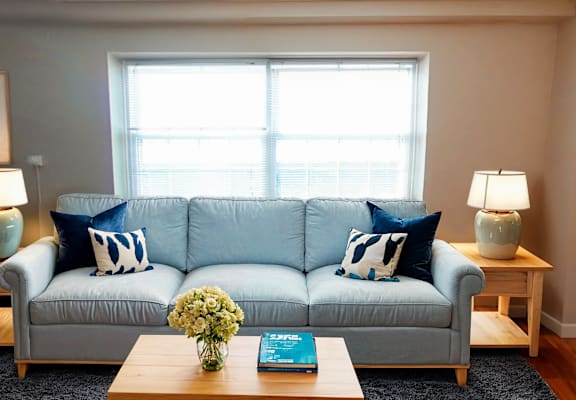a living room with a couch and a coffee table