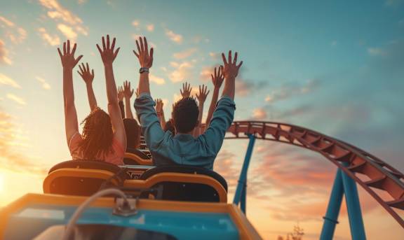 People enjoying a thrilling ride at an amusement park.