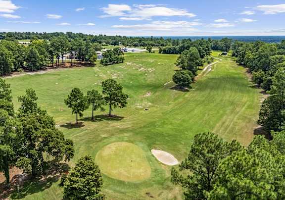 a view of the golf course from the air