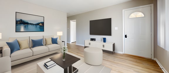 a living room with a couch and a coffee table at Stonebrook of Franklin, Franklin