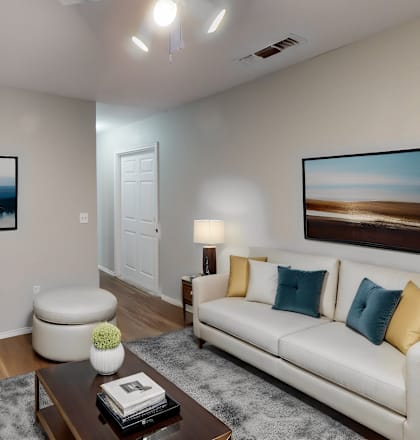 a living room with a couch and a coffee table