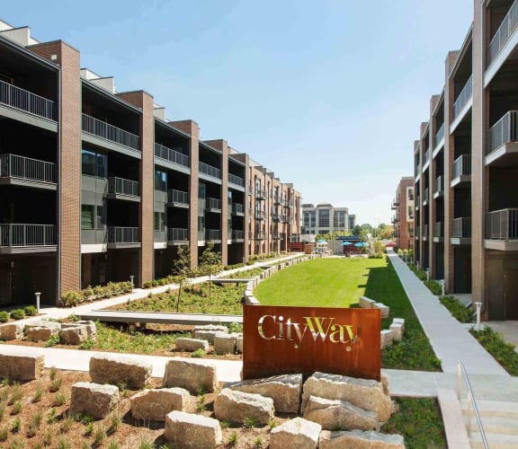 City Way Community Entrance with Manicured Landscaping at CityWay Apartments in Indianapolis, IN