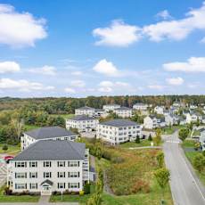 an aerial view of a neighborhood of houses