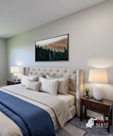 a bedroom with a large bed and a window