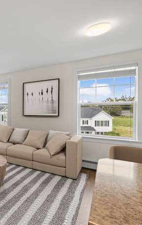 a living room with a couch and a coffee table